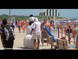 Snowman Prank Scaring Girls at the Beach