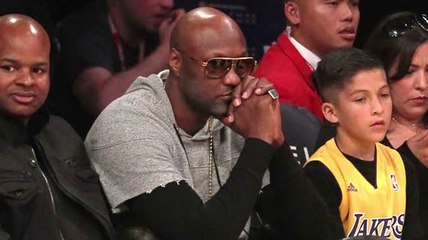 Lamar Odom assiste à un match des Lakers