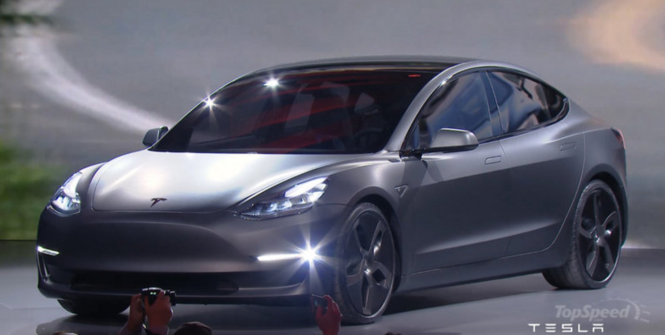 ⁣Tesla Unveils Model 3