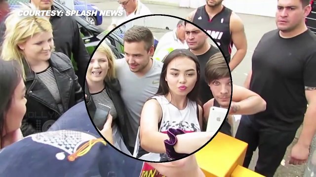 BUTT GRAB: Liam Payne Grabs Louis Tomlinsons Junk on the Brit Awards Red Carpet