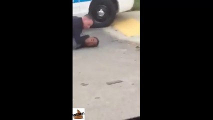 Looks like the cop was trying to twist his head off