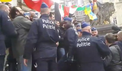 Police break up protesters in Brussels