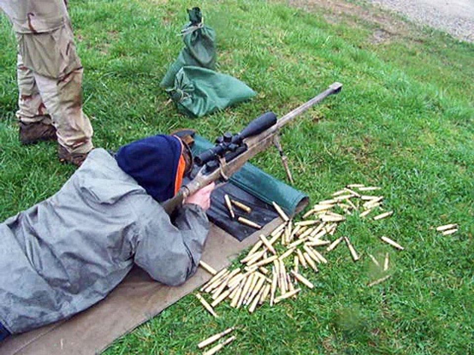 50. cal sniper rifle hitting tank