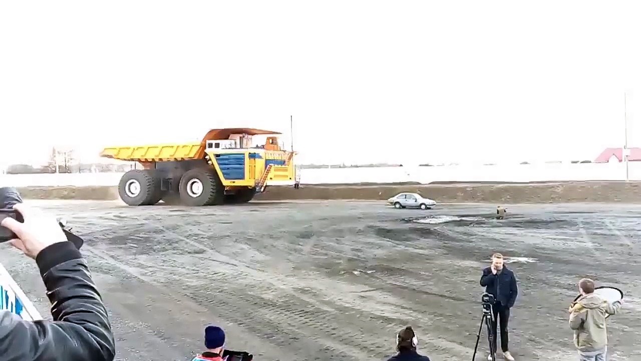 450-ton dump truck crushes passenger car