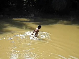 Bimaya taking bath in the river in Sheragada 2012