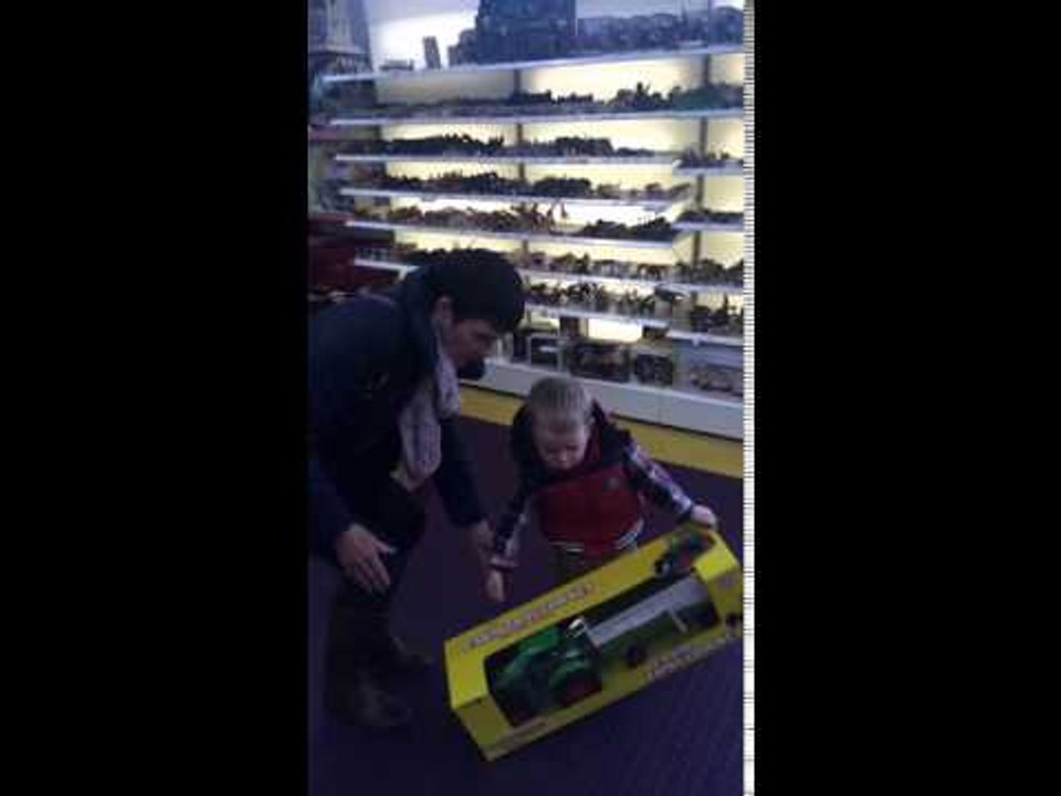 Little Boy Loves His New Tractor