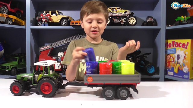 Bruder. Машинки Трактор Погрузчик. Видео для детей. Игорек делает дорогу из лизунов. Tiki Taki Boys