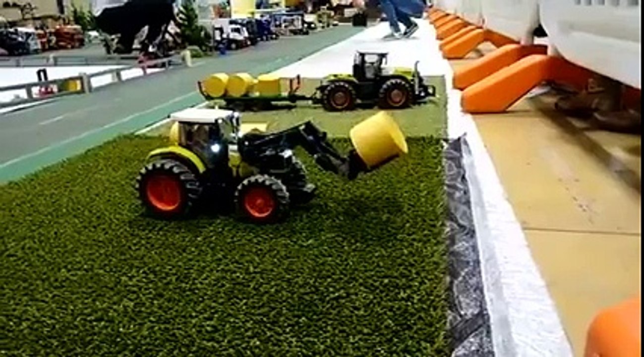 Bruder john deree tractor is on work
