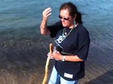 Spiritual Native American Healer Blessing Waters at Lake Superior and Two Hearted River