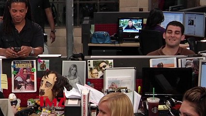 Kanye West Slams Head on Sign