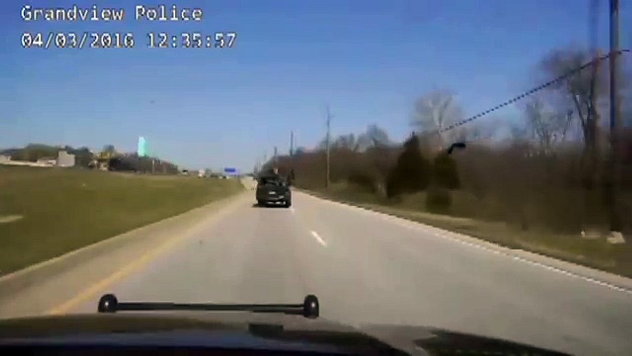 Driver thrown out of Truck after Crashing during police chase, Officer saves man's life