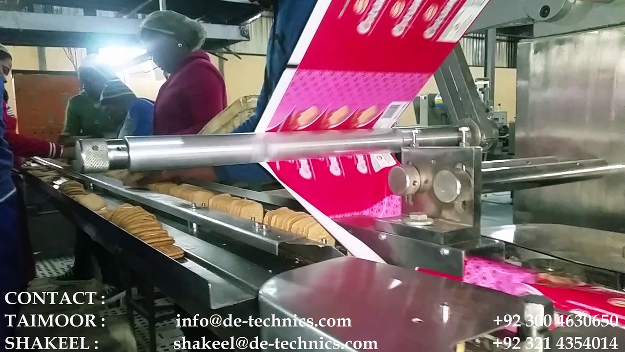 SLUG PACK MACHINE ON-LINE FOR PACKING BISCUITS STANDING ON-EDGE, MACHINE WORKING IN SOUTH AFRICA