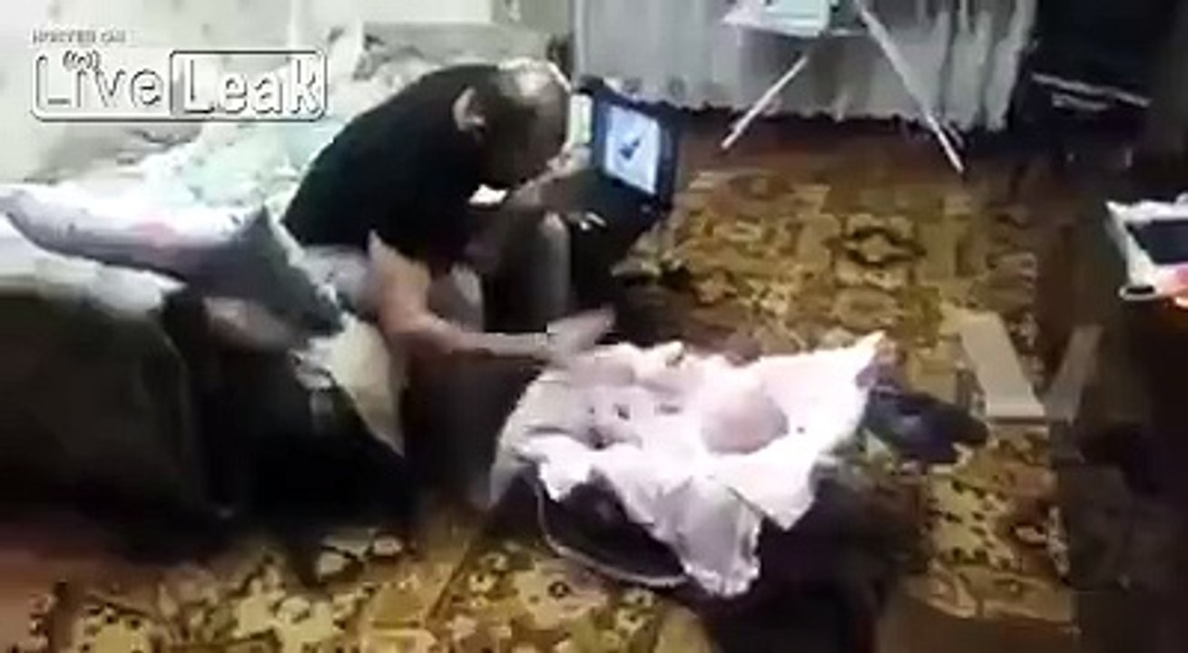 the cat thinks the father hits his baby