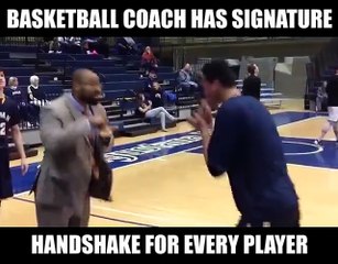 Basketball coach has a handshake for every player...