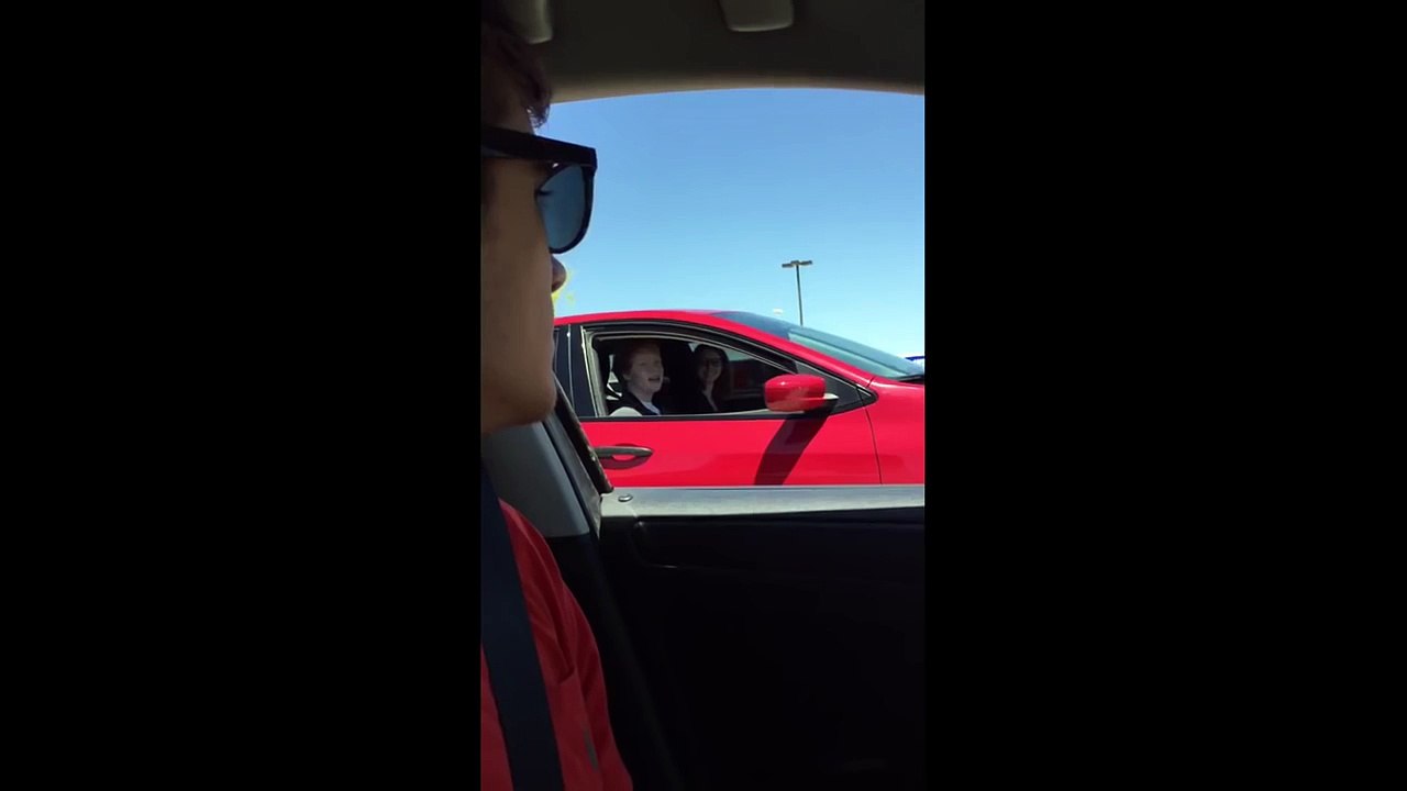 I pulled up to a red light and looked to my left boy sings unwritten