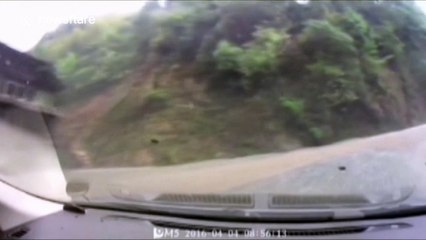 Landslide in China caught on dash-cam