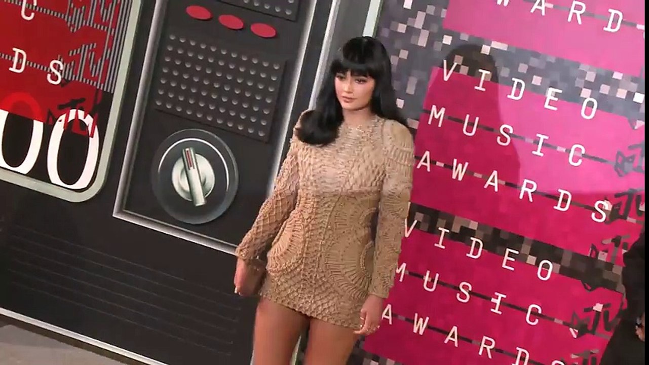 Kylie Jenner's Scary Plastic Paper Mag Cover & Nail Polish Collection