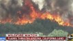 Flames threaten Arizona, California land