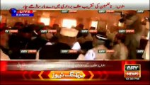 Members of PTI and JUI fight during the mayor's oath taking ceremony