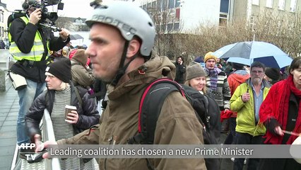 New Iceland government takes over, protests continue