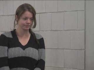 Elizabeth Johnson walks into 4th Avenue Jail