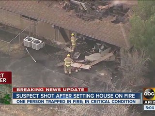 Suspect shot after setting house on fire