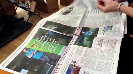 Making fire lighters from newspaper