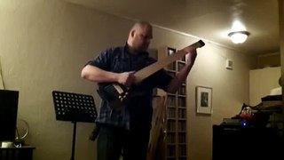 Clement 6-string headless bass