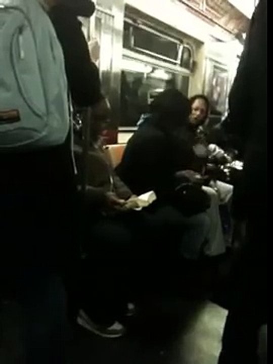 Two girls fighting on the three train