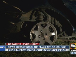 Car loses control, slams into sign