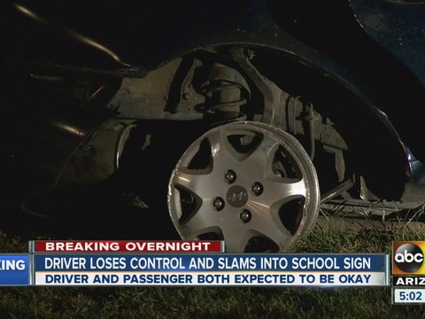 Car loses control, slams into sign