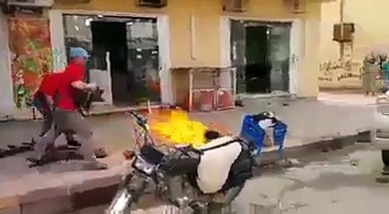 A Brave Man Fighting with Fire Cylinder - Great Work