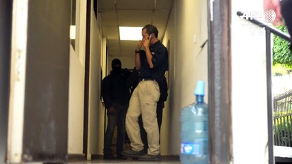 Police raid El Salvador branch of Panama Papers law firm