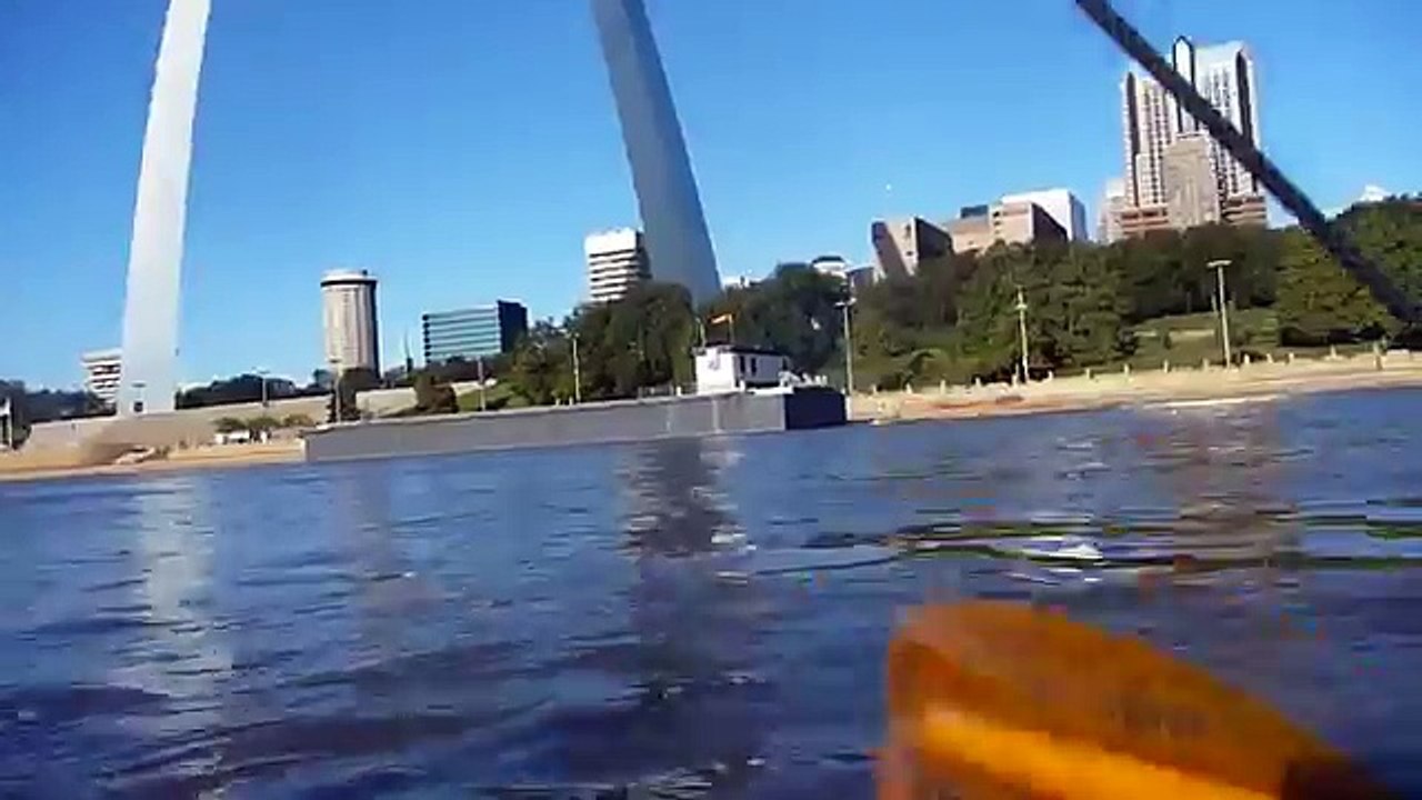 paddling past the arch