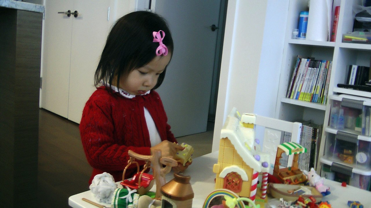 Girl Playing Her Sylvanian Families House
