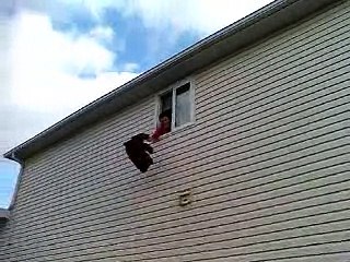 Crazy Woman throwing stuff out a window