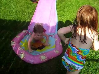 Kids and Neighbor kids on the Slip and Slide