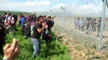 Macedonian border police fire tear gas at migrants