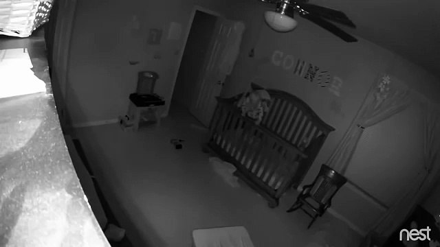 Spooky video shows 'possessed' crying baby balancing on rim of cot sparking special effects claims