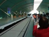 maglev train pulling into station in shanghai