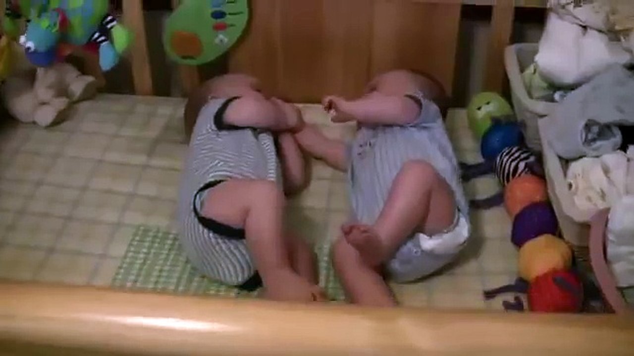 Twin Baby Boys Laughing at Each Other