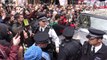 Scuffles as protesters force Tories from their vehicle in London