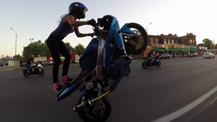 Crazy girl does motorcycle stunts-3