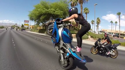 Crazy girl does motorcycle stunts-2