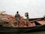Brickies Labourer carrying 22 bricks, Bangladesh