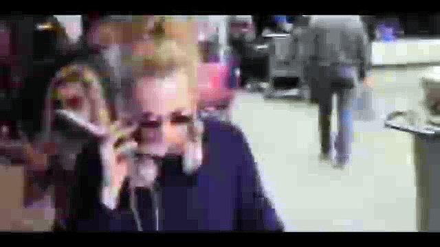 Moment Cara Delevingne is photobombed by Jean Claude Van Damme