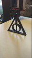 3d printed deathly hallows necklace.