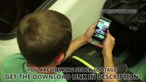 Man playing online games on smartphone, using app, hiding phone in bag pocket. Stock Footage