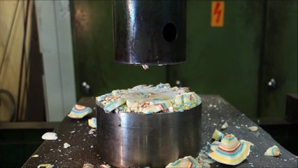 Crushing Jawbreaker with hydraulic press