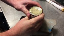 Open a tin can without a can opener